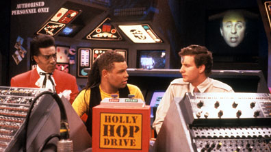 The story of the Holly Hop Drive encompasses an absurd parody of a traditional SF trope. 